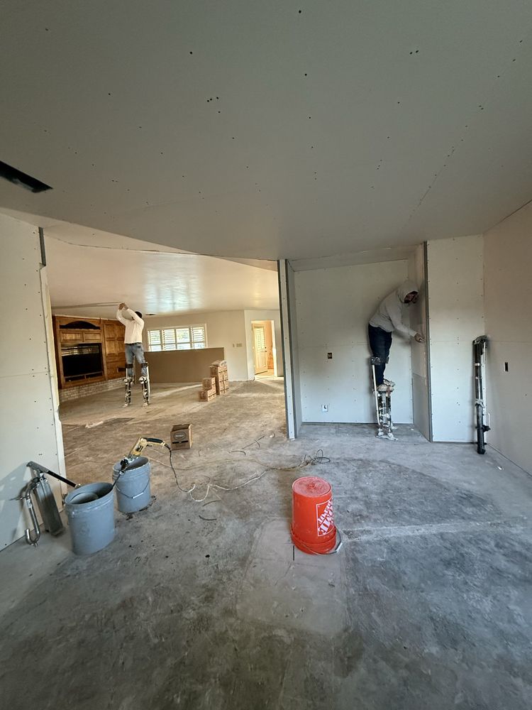 Drywall hung around a kitchen space