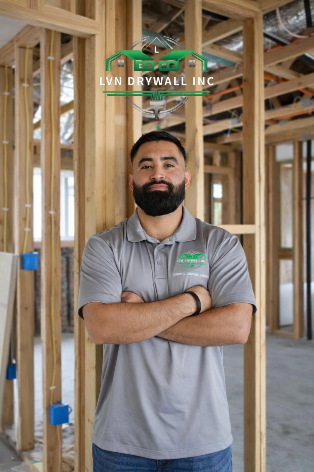 Eulalio V. Nunez, owner of LVN Drywall Inc., on a framed job site